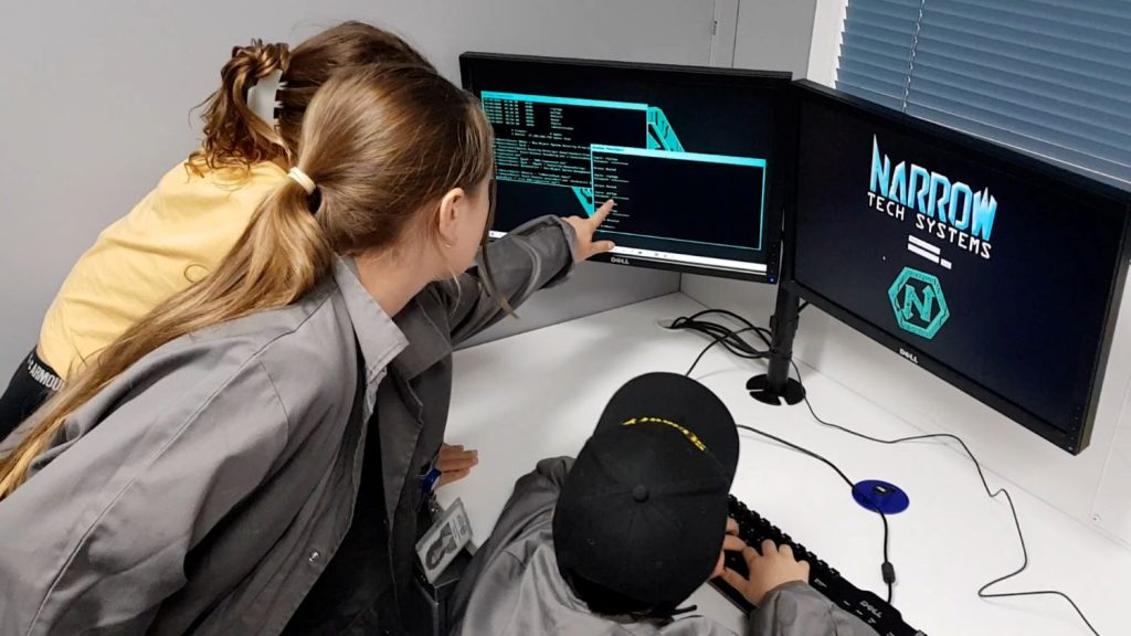 Children searching for hidden clues during a school holiday escape room in Western Sydney.