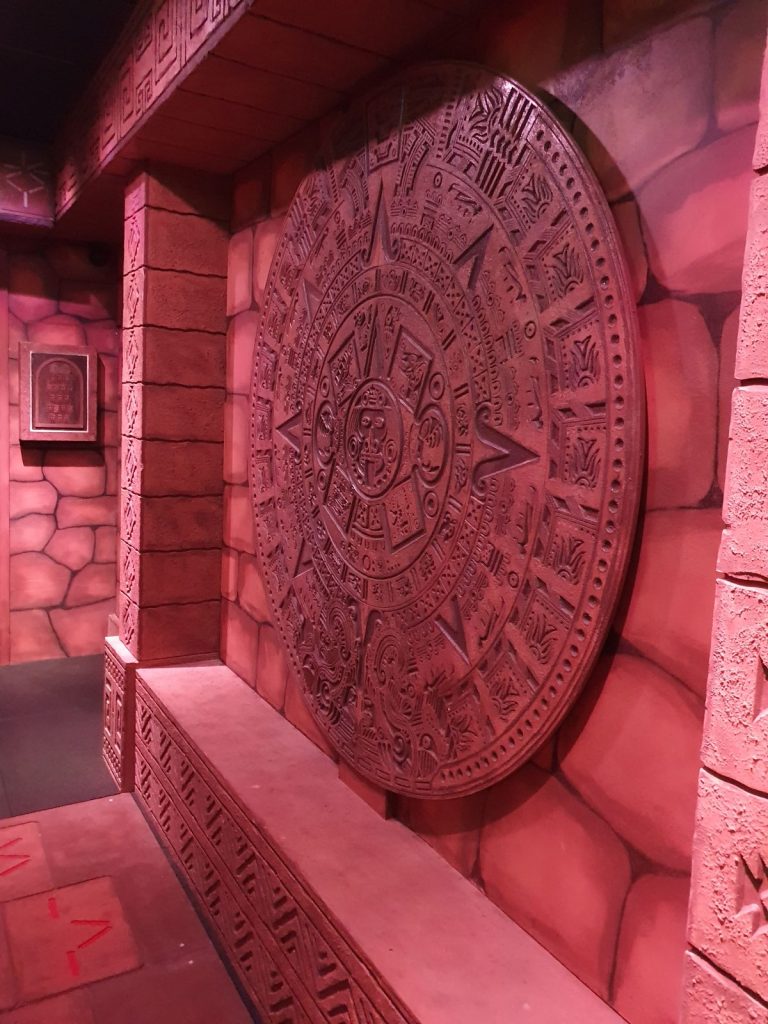 Aztec calendar stone puzzle feature inside The Hidden Temple escape room at Narrow Escape Rooms Penrith