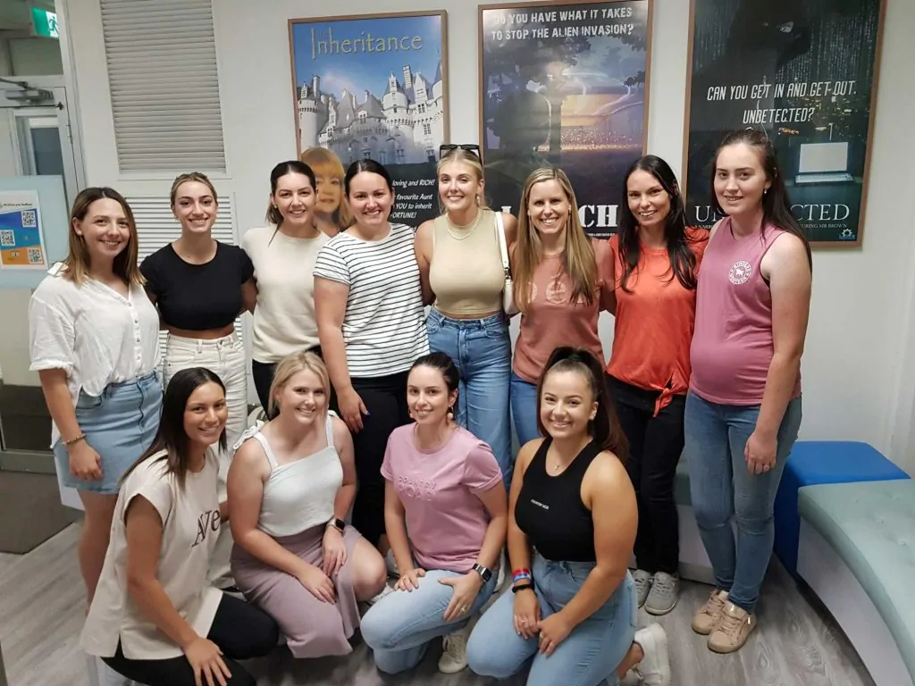 Team of childcare educators at Narrow Escape Rooms for some team bonding.