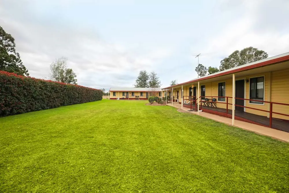 The lawn and accommodation at Castlereagh Conference Centre Penrith